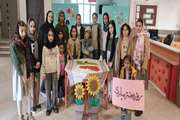 دختران عضو مرکز شماره ۱۴ کانون کرمانشاه با هنر آشپزی نمای پرچم ایران را ساختند